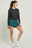 lija-rally-top-black-player-skort-pine-green-tennis-jpg